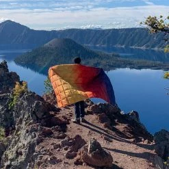 Rumpl Down Puffy Blanket - Pyro Tri-Fade -Camp & Hike Deals Shop 84b61ffe 78a4 40f0 8a79 438dc66e5b2e